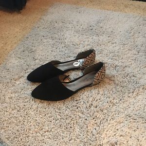 Black and Aztec print flats